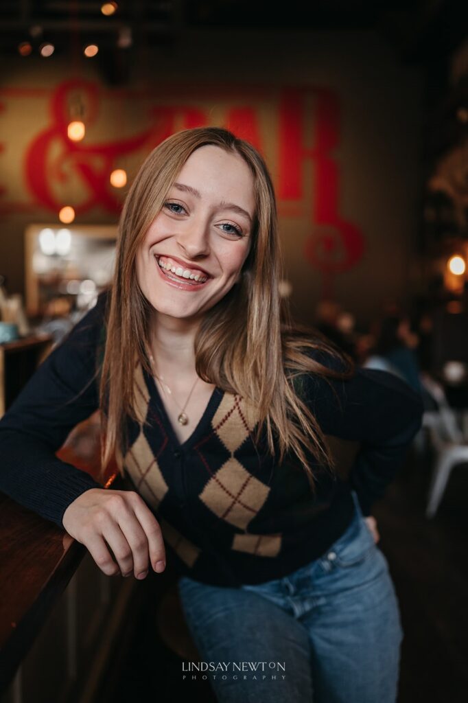 senior girl portrait in a coffee shop during her senior photography experience