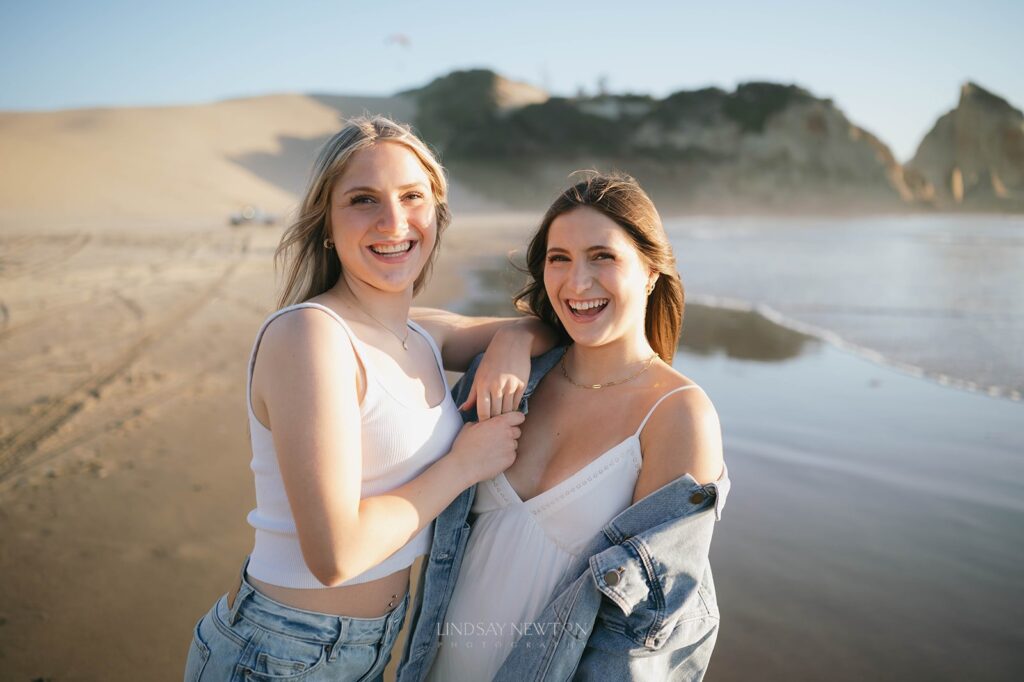 Minimal and editorial senior session with twin girls at Cape Kiwanda.